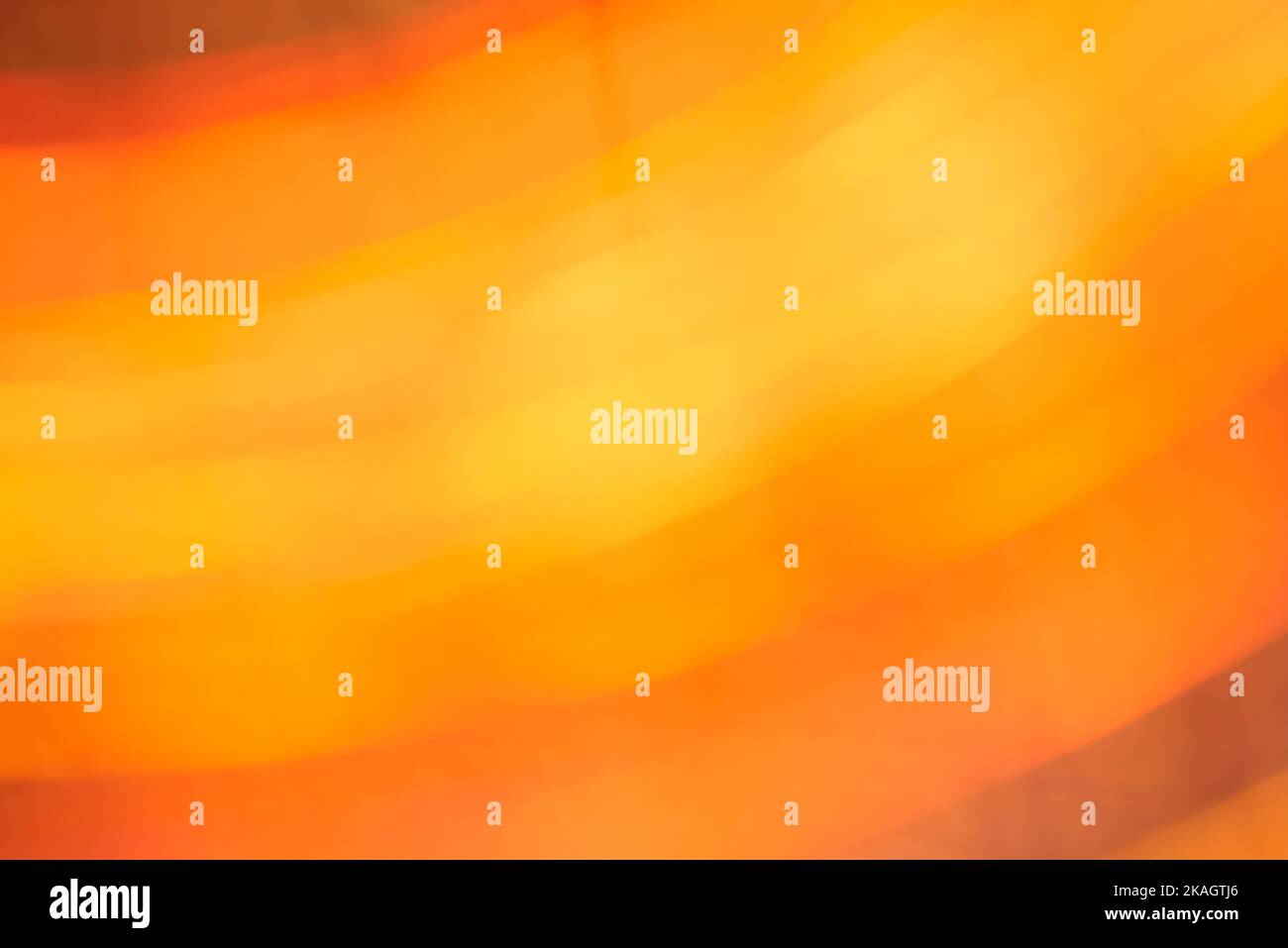 Abstract orange and yellow background, blur dynamic flowing design