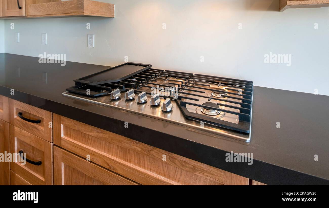 Panorama Modern craftsman kitchen counter with gas cooktop with griddle