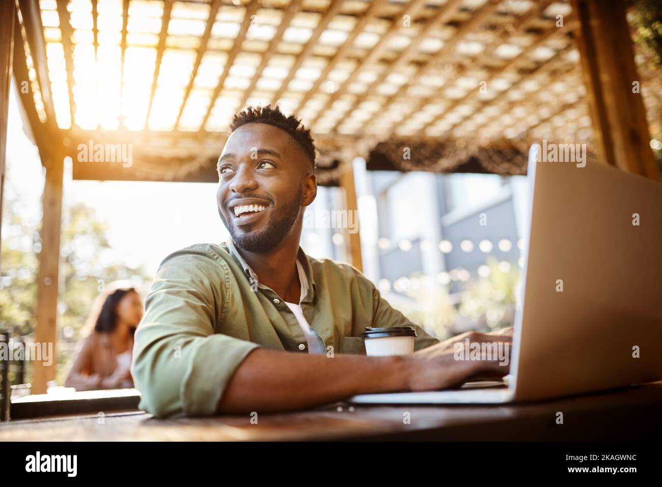 Hes full of bright ideas for his blog. a handsome young man using a laptop in a coffee shop. Stock Photo