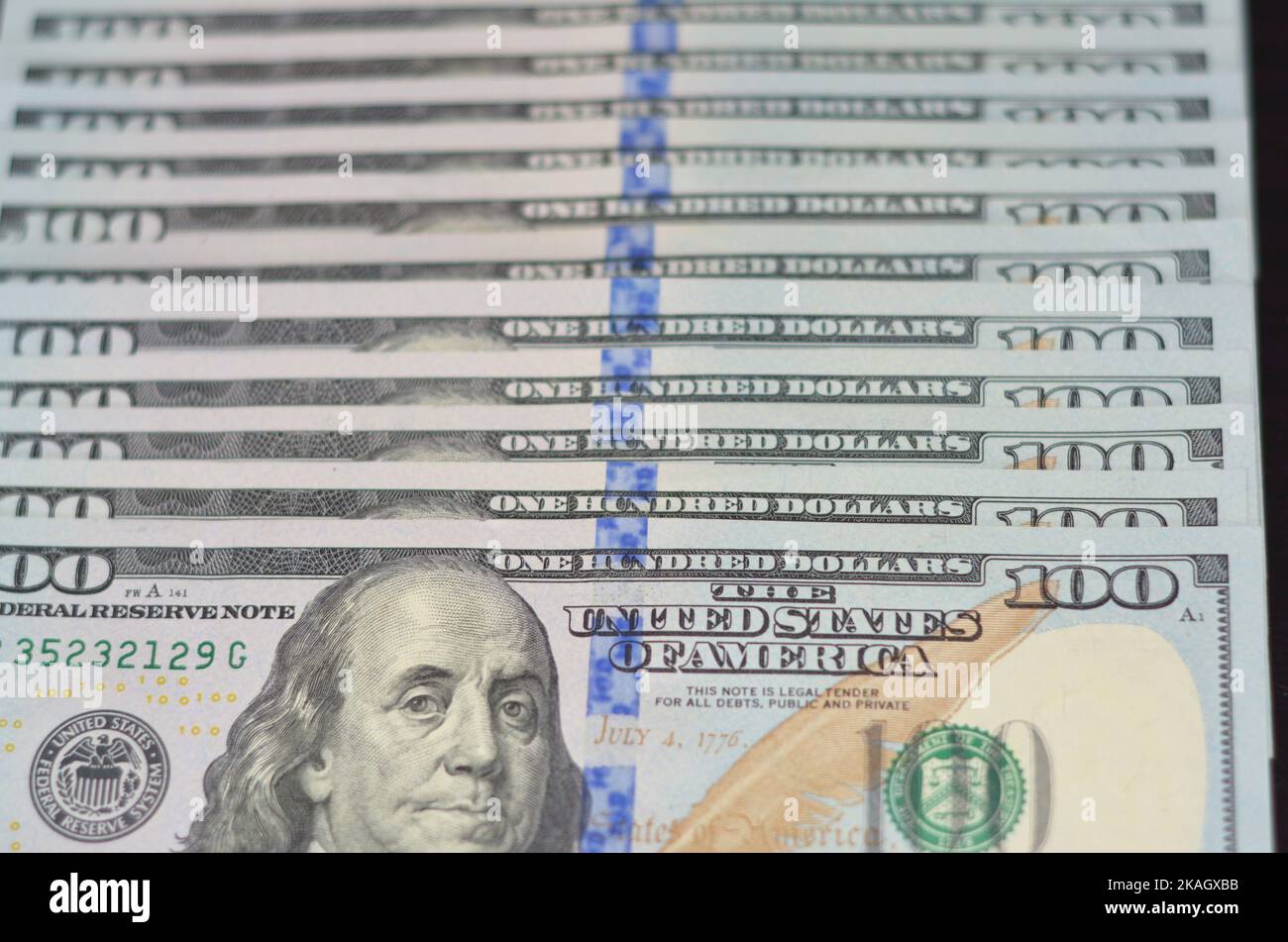 us-dollars-background-as-a-concept-us-dollar-devaluation-and-dollar-news-2KAGXBB.jpg