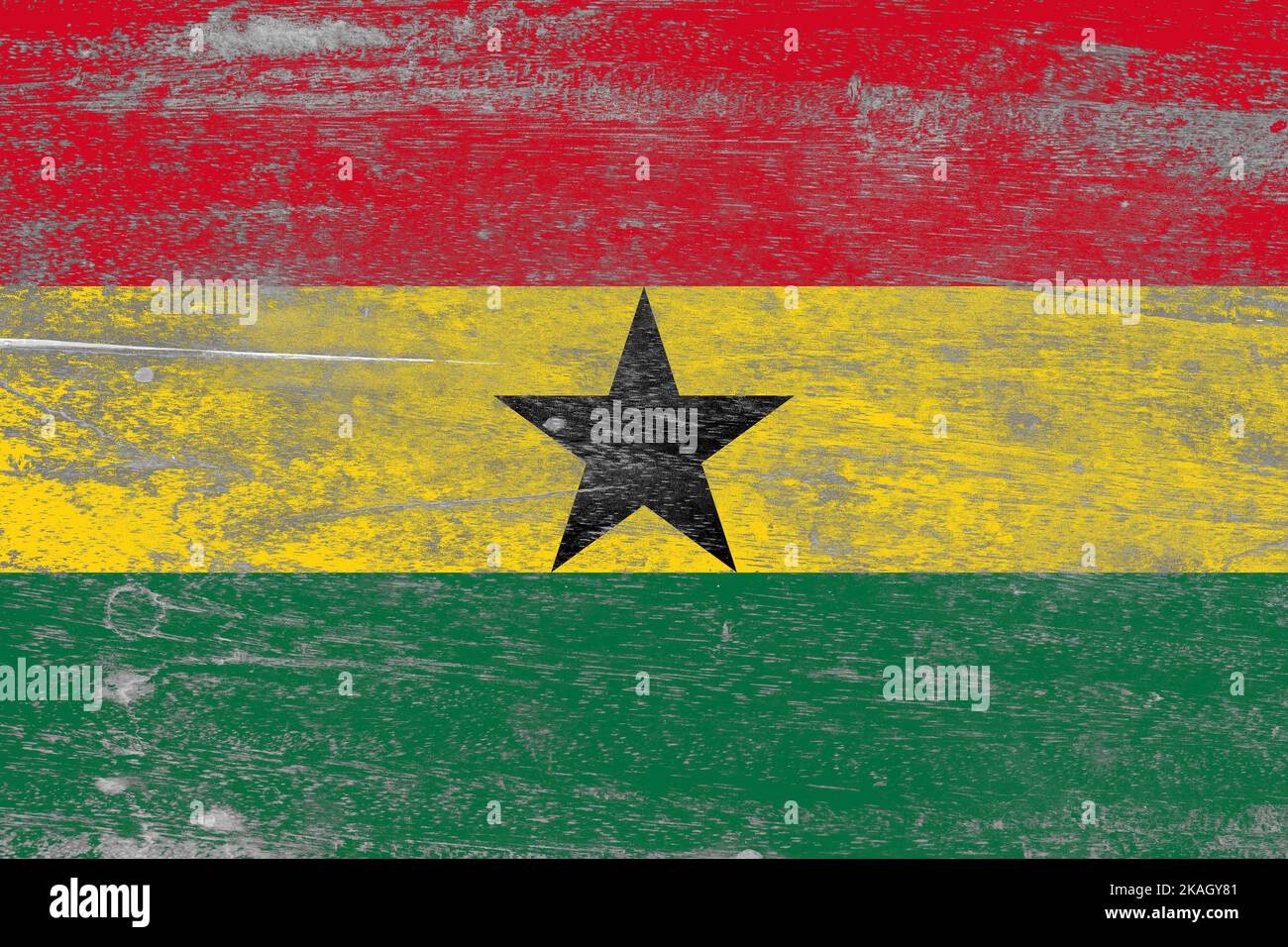 Ghana flag painted on a damaged old wooden background Stock Photo