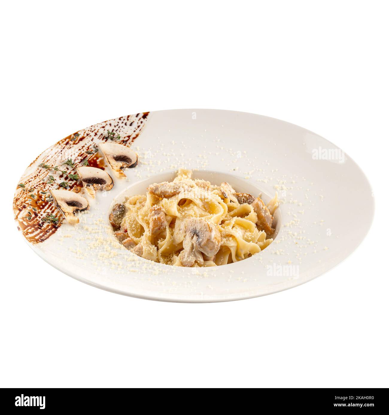 Portion of creamy fettuccine mushroom pasta Stock Photo