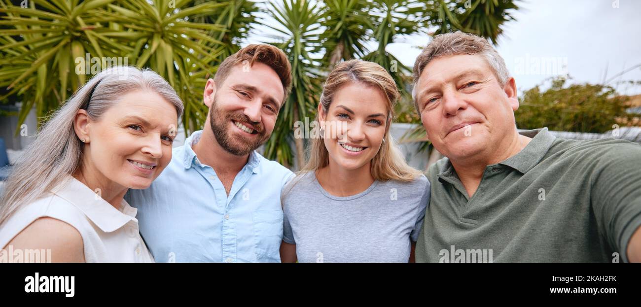 Selfie and portrait of family in a garden with love, hug and peace together. Happy, smile and relax mother and father with adult children, photo and Stock Photo
