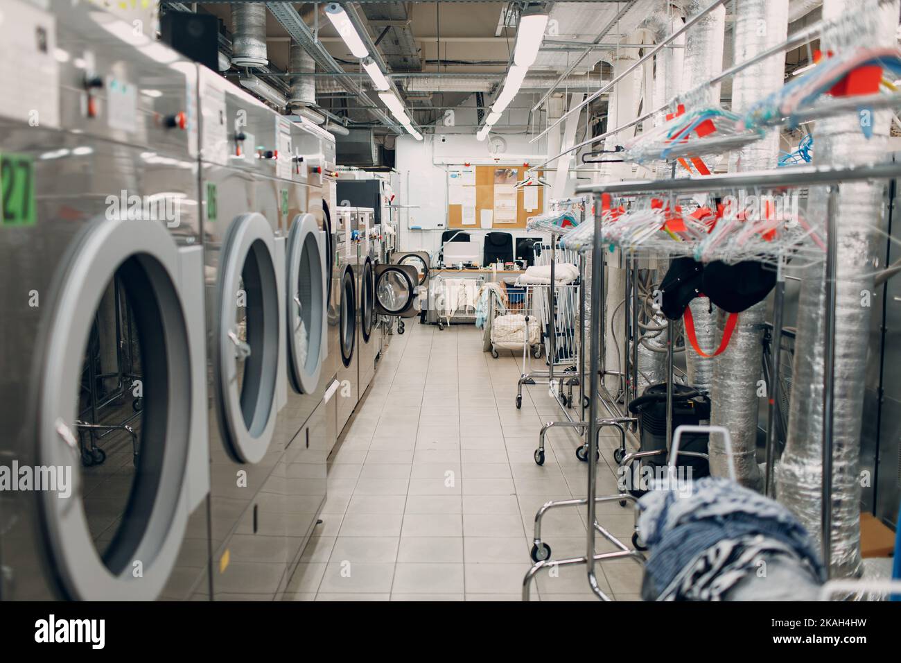 Dry cleaning clothes. Clean cloth chemical process. Laundry industrial