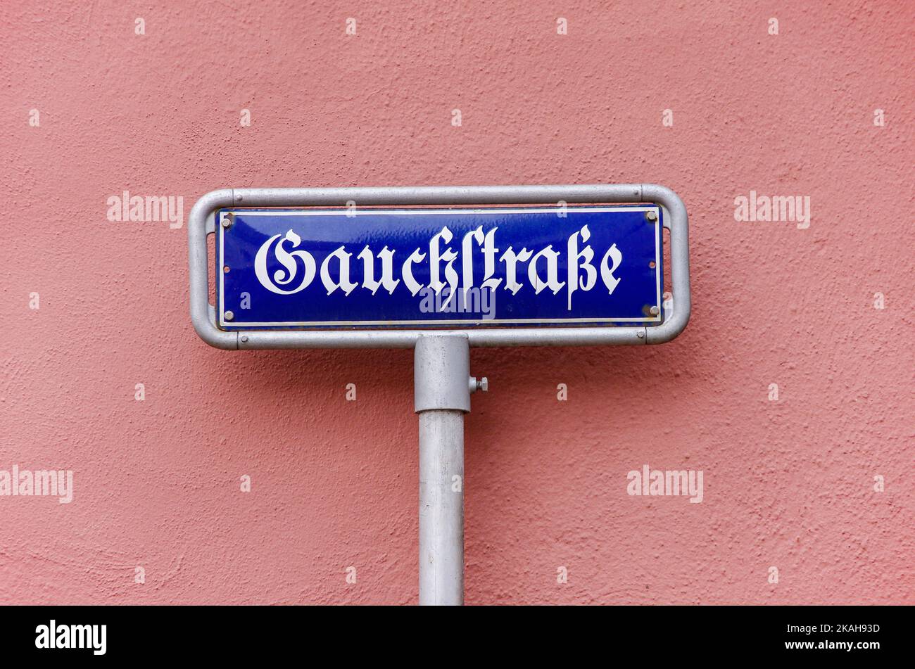 Street sign Gauchstrasse, a street sign which reads like Gauckstrasse as if it was named after the 11th Federal President of Germany. Stock Photo