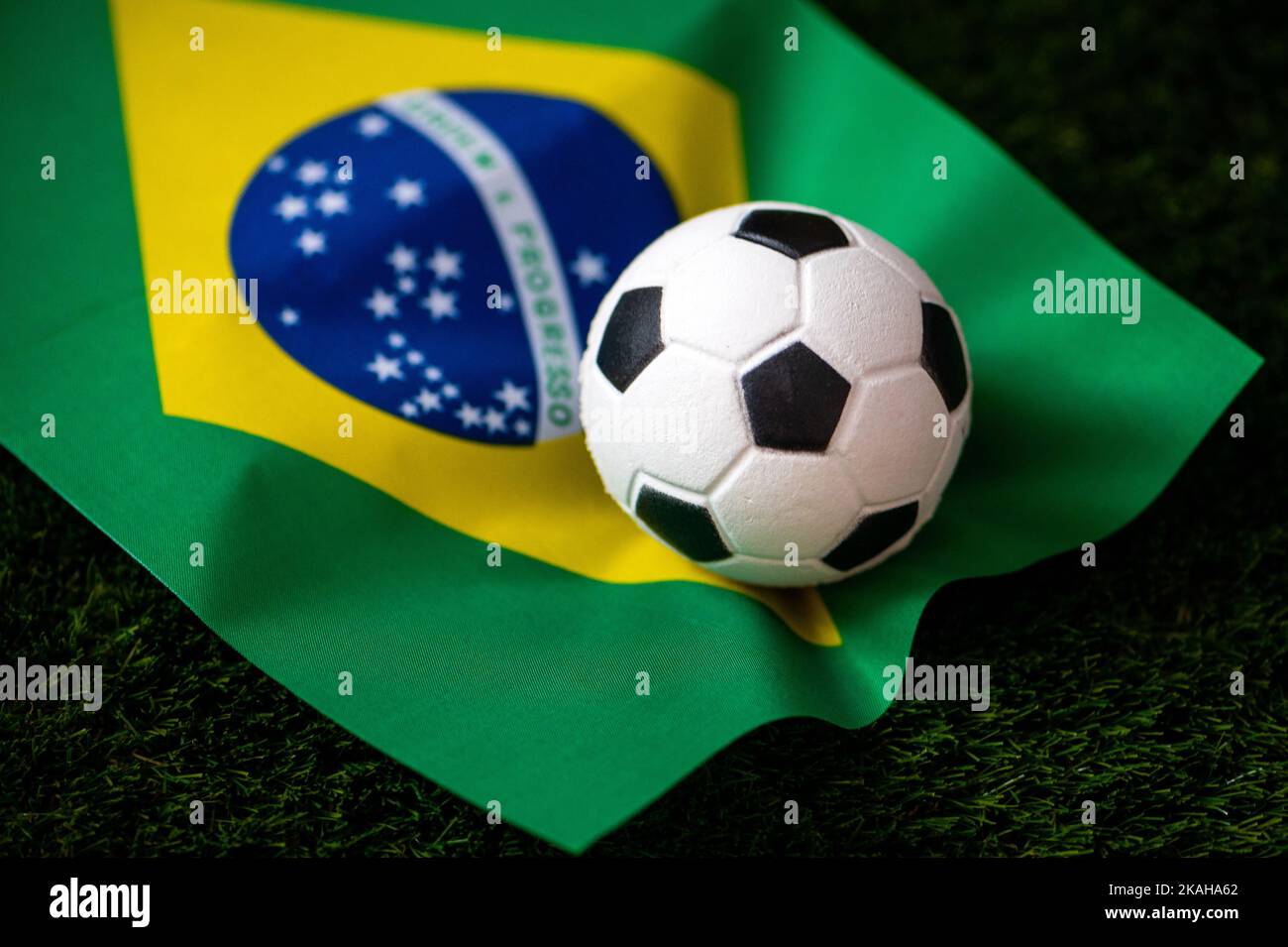 Brazil national football team. National Flag on green grass and soccer  ball. Football wallpaper for Championship and Tournament in 2022. World  interna Stock Photo - Alamy