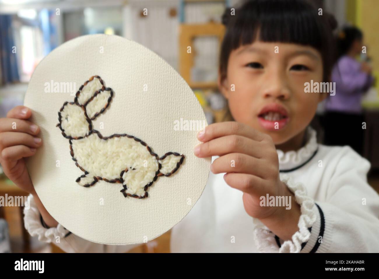 The Teacher Is Teaching Children How To Draw The Five Cereals Which The teacher is teaching children how to draw the five cereals which