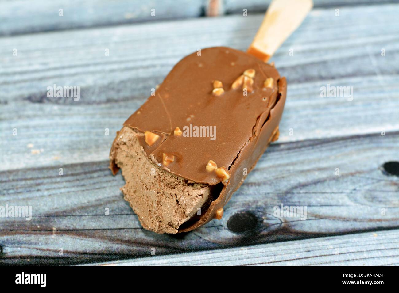 chocolate ice cream stick coated and covered with a layer of dark