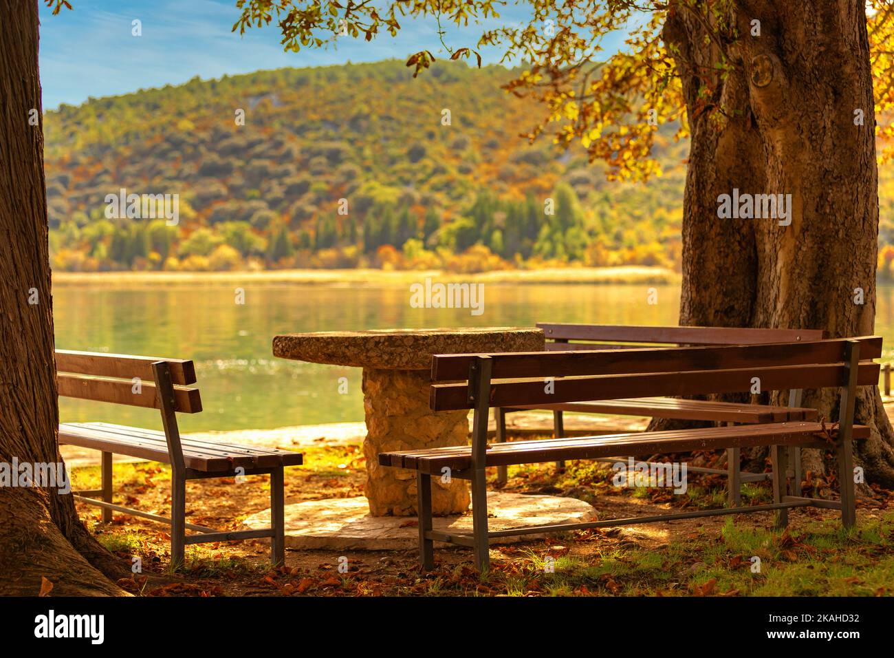 Visovac Island and Visovac Monastery in golden autumn colors. Krka national park in Croatia. Fall nature landscape. Stock Photo