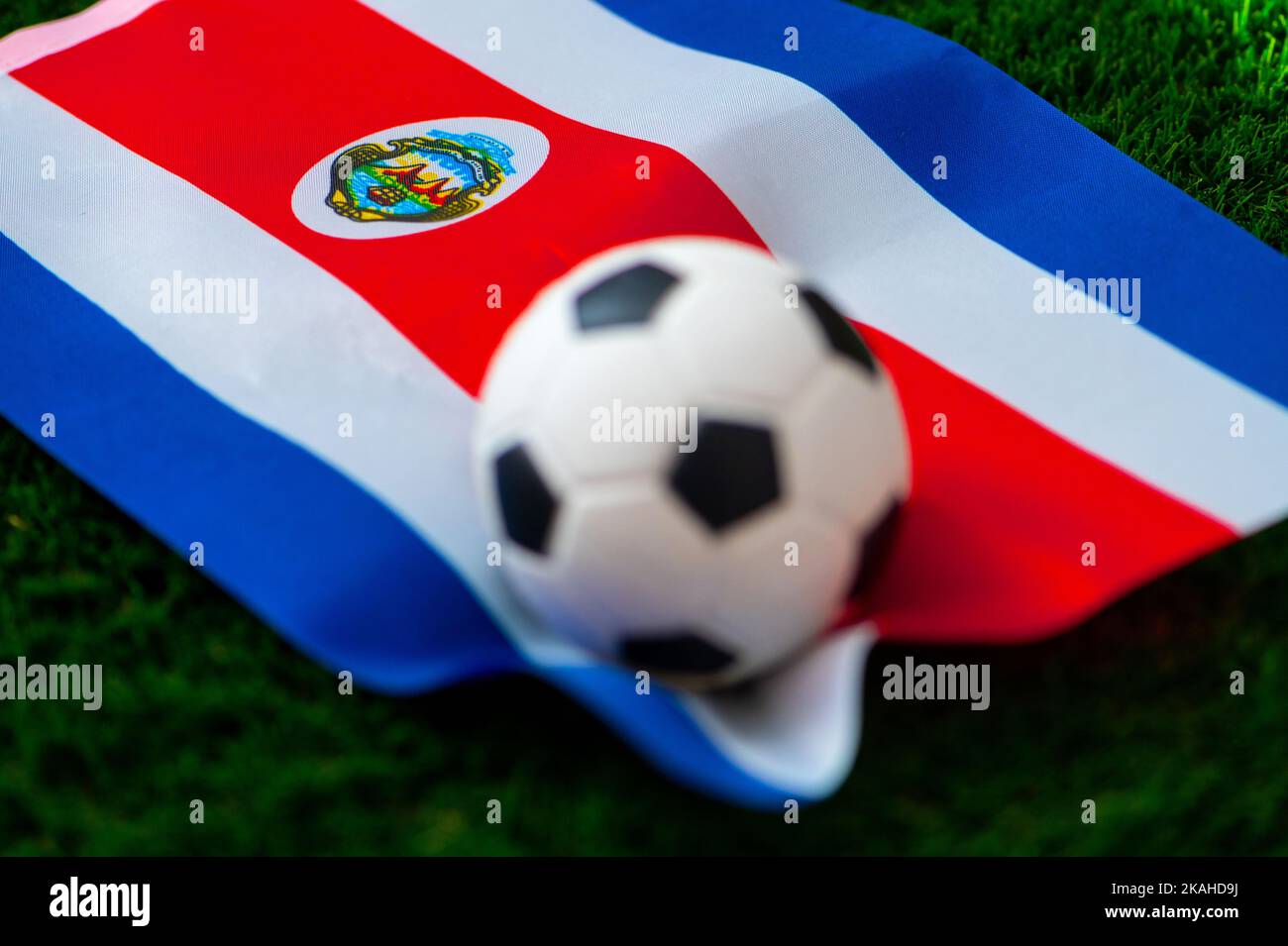 Costa Rica national football team. National Flag on green grass and