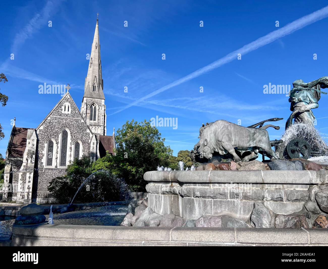 Gefion Fountain in front of St Alban's Anglican Church, Copenhagen, Zealand, Denmark Stock Photo