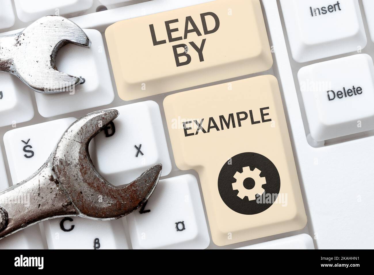 Conceptual display Lead By Example. Concept meaning Be a role model by following the rules and