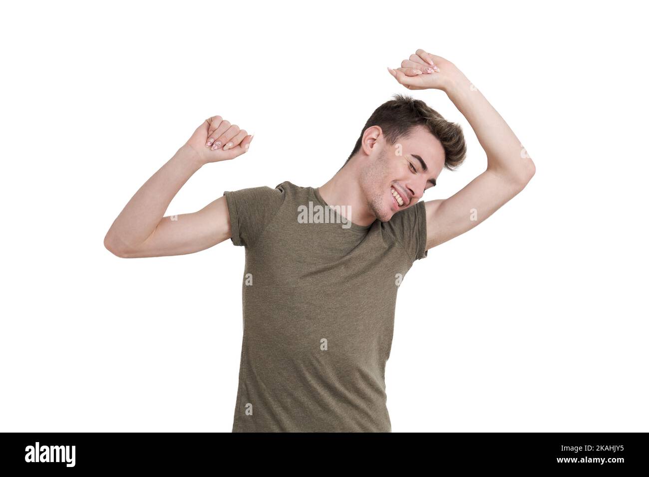 Young caucasian man dancing, isolated. Stock Photo