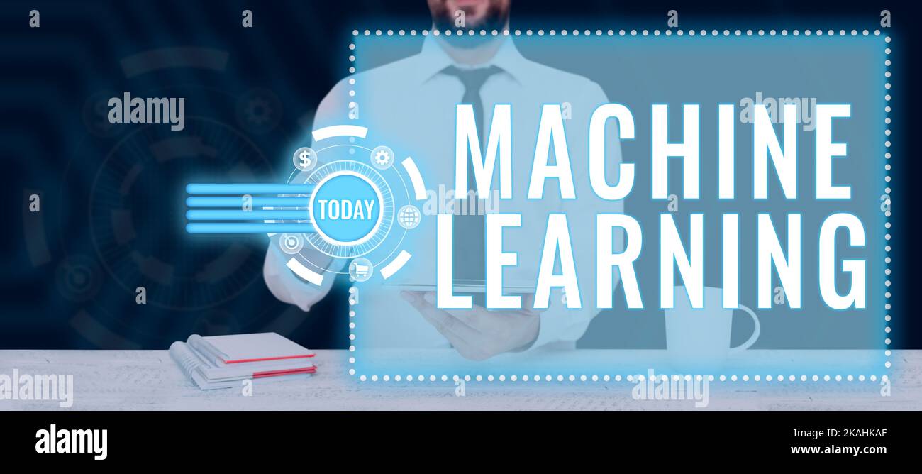 Handwriting text Machine Learning. Word for the concept that a computer can learn new data itself Stock Photo