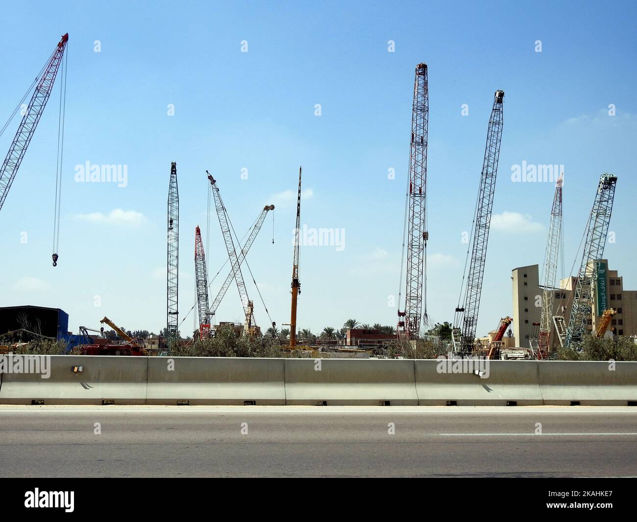 Alexandria, Egypt, September 9 2022: many overhead cranes at the site of poultry chicken farm and factory for products providing efficient and conveni Stock Photo