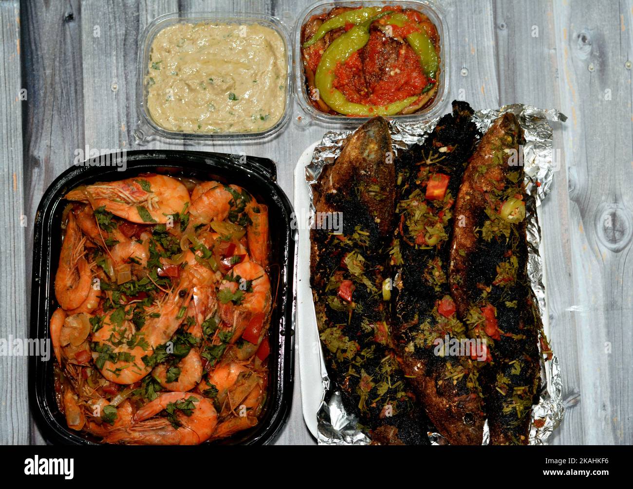 Seafood cuisine of Boiled shrimps mixed garlic, lemon, parsley, pepper