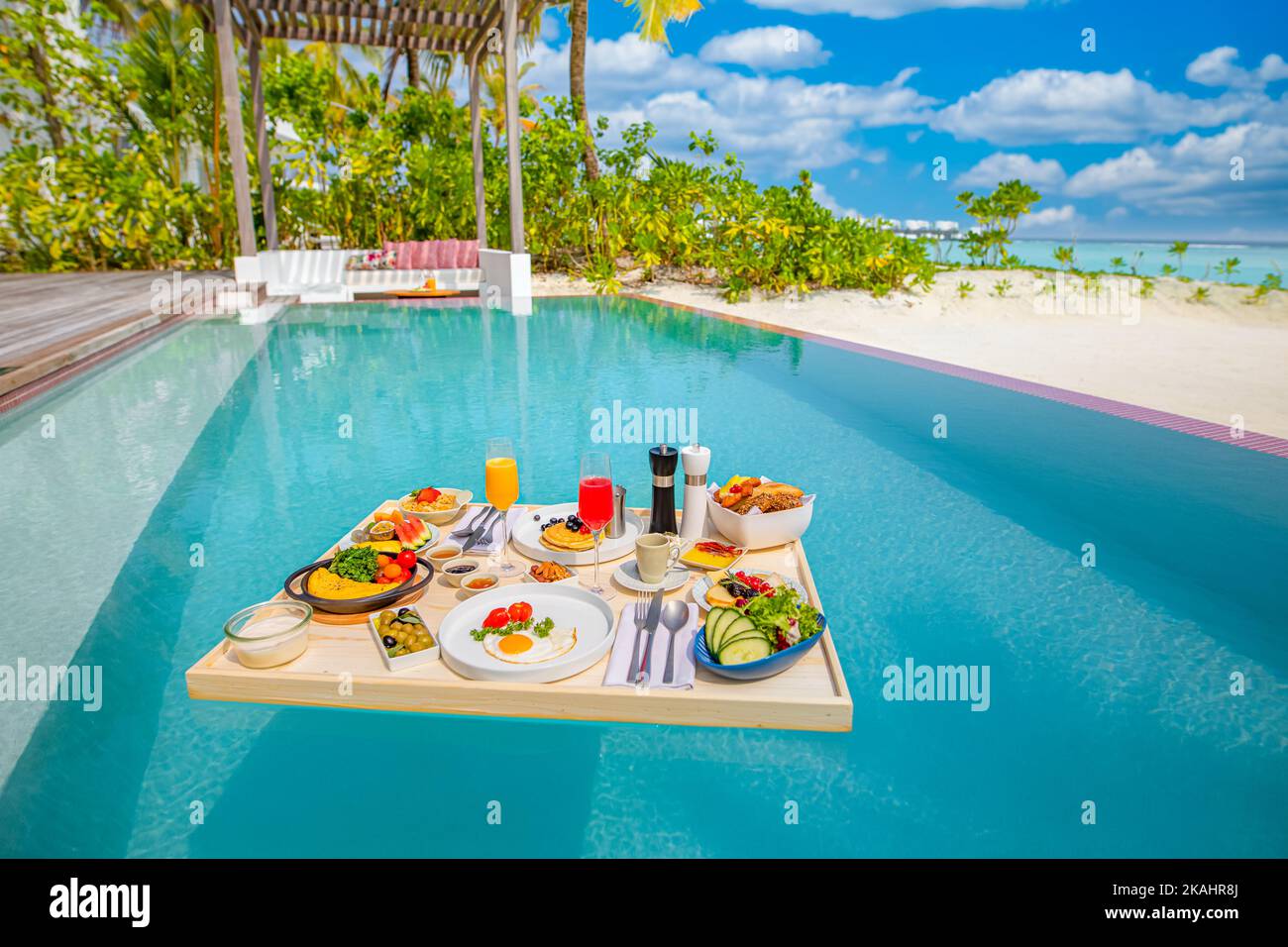 Breakfast in resort swimming pool, floating breakfast in luxury