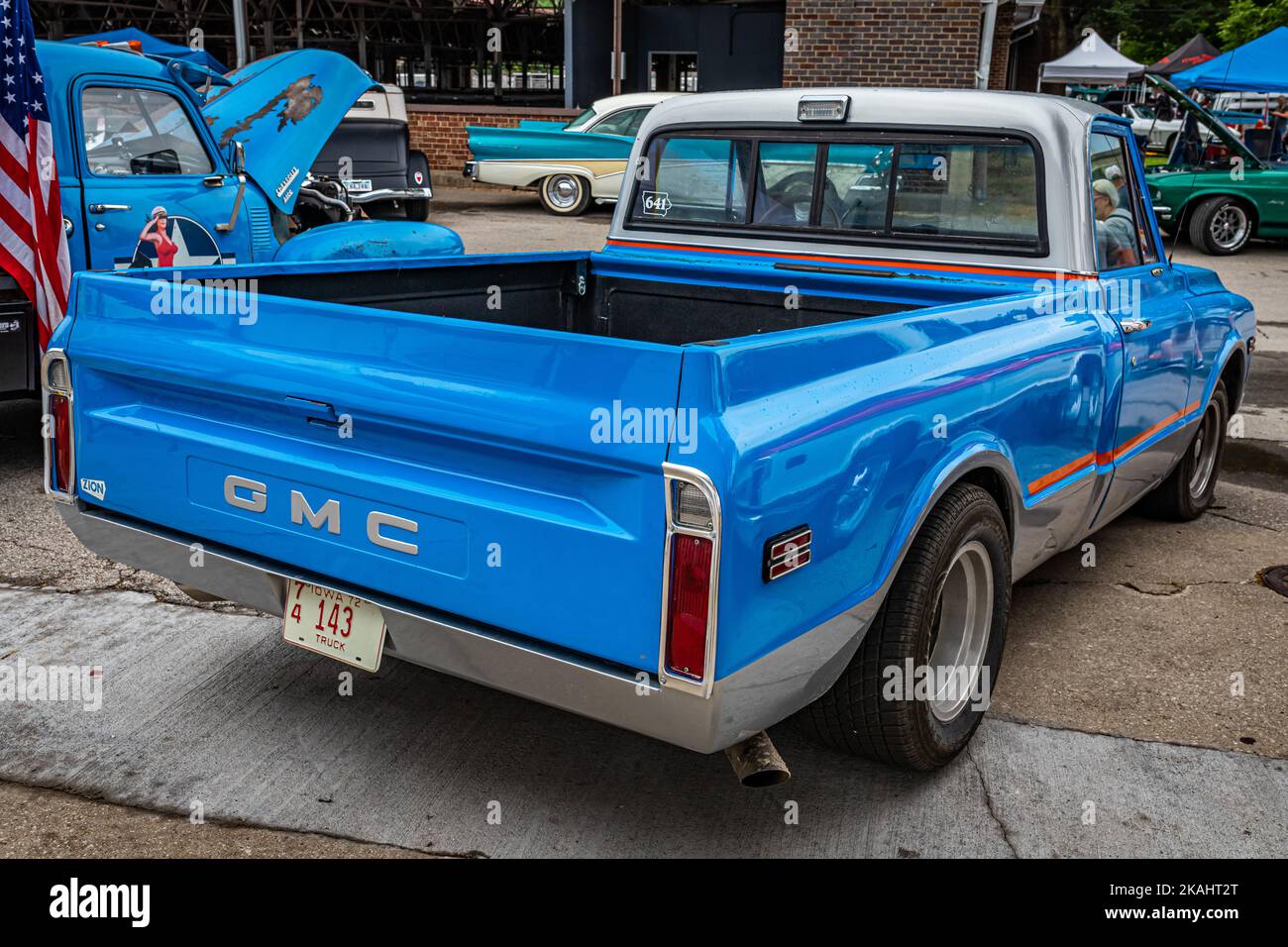 Des Moines, IA - July 01, 2022: High perspective rear corner view of a 1972 GMC C10 Pickup Truck at a local car show. Stock Photo