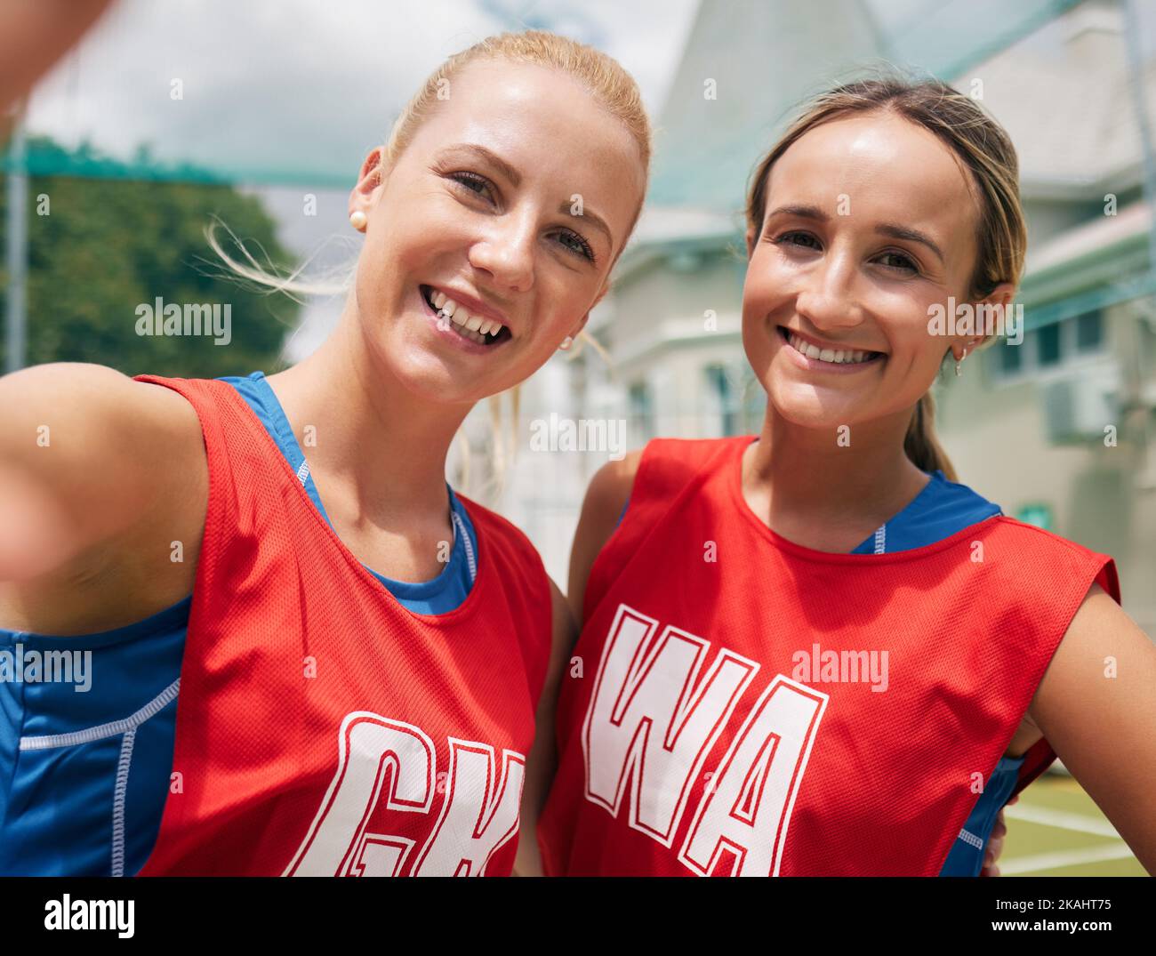 Selfie, sports and women team smile after a competition or game on netball court, field or outdoor park in Australia with cellphone for social media Stock Photo