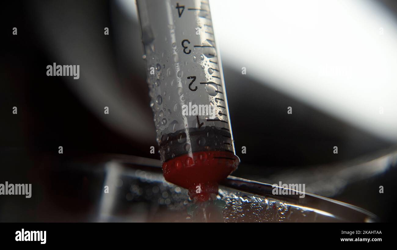 Syringe from which blood is drawn, taking medical blood sample