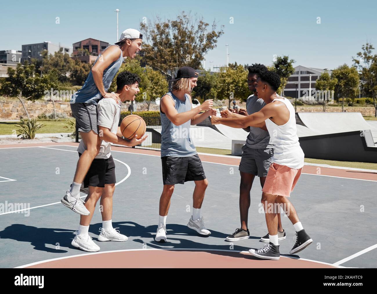 Basketball player, fist bump and friends celebration for training goal