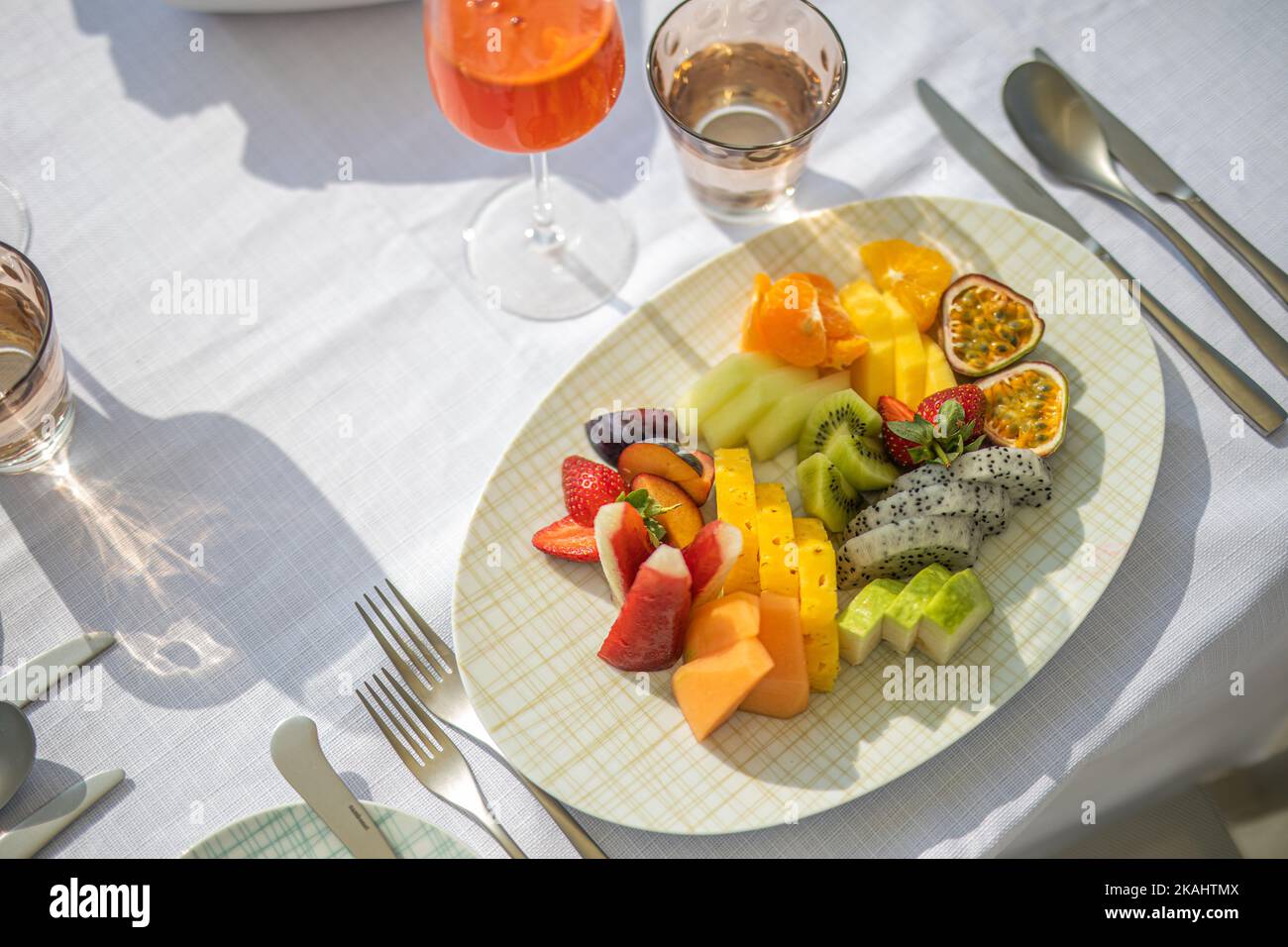 Luxury breakfast food on white table, with beautiful tropical sea view background, morning time summer holiday and romantic vacation concept, luxury Stock Photo