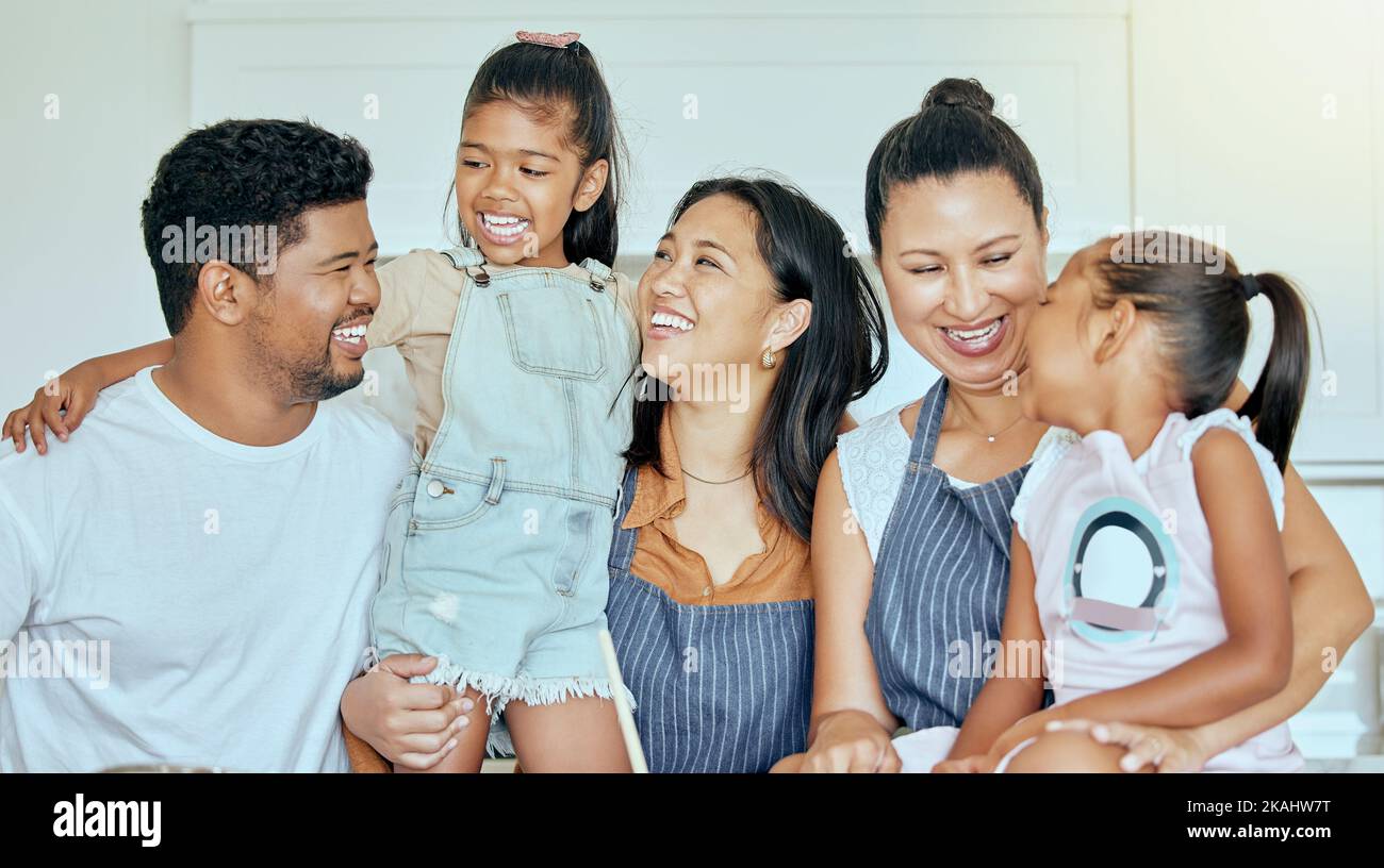 Grandmother, mom and father cooking with children as a happy family bonding and spending quality time in Mexico. Smile, mama and dad with mature woman Stock Photo