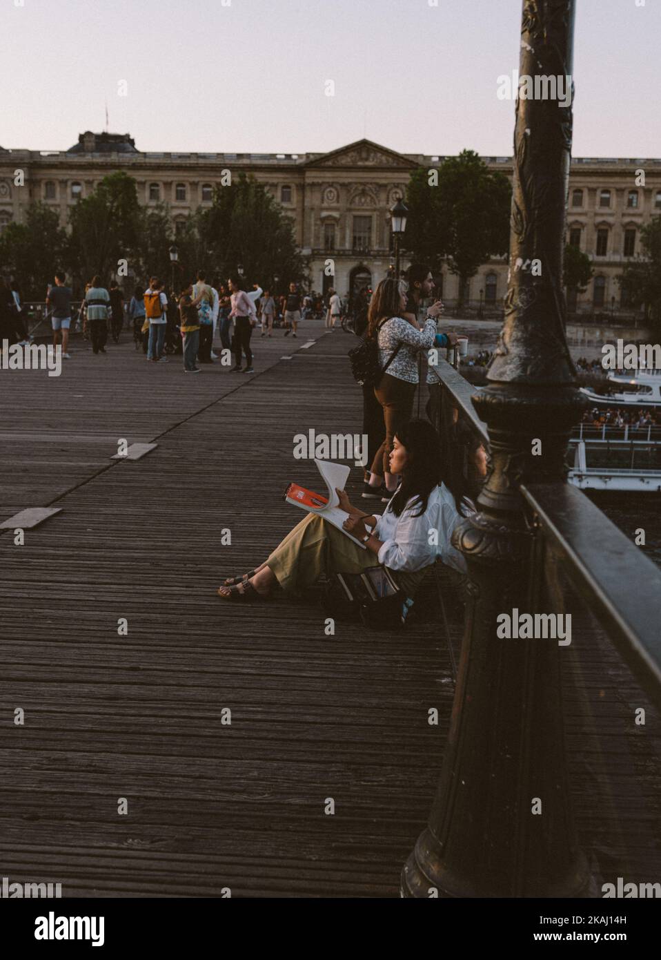 A vertical shot of people in the streets of Paris, France Stock Photo ...