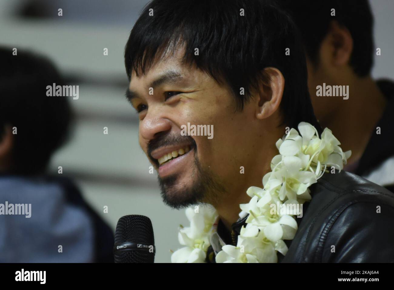 Filipino boxing icon Manny Pacquiao shares a light moment with members of the press upon his arrival at the Ninoy Aquino International Airport in Manila on 14 April 2016. Pacquiao announced his retirement from the sport after his win over American boxer Timothy Bradley in the WBO International Welterweight Championship title bout. He made the decision to retire to focus on his family and political ambitions as he is running for a senate seat in the upcoming Philippine elections. (Photo by George Calvelo/NurPhoto) *** Please Use Credit from Credit Field *** Stock Photo