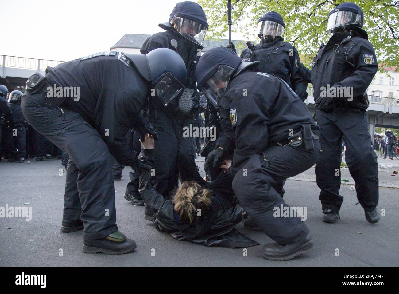 Policemen arrest a demonstrator during the clashes in the Kreuzberg district on May 1, 2016 in Berlin, Germany. May Day, or International Workers' Day, was established as a public holiday in Germany in 1933. Since 1987 May Day has also become known in Berlin for violent clashes between police and mostly left-wing demonstrators. (Photo by Emmanuele Contini/NurPhoto) *** Please Use Credit from Credit Field *** Stock Photo