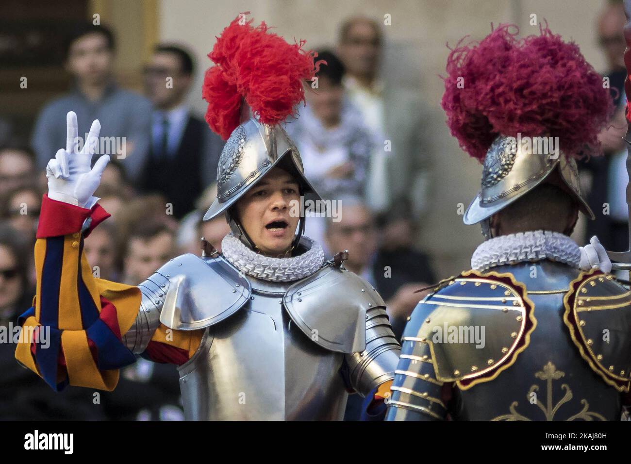 Swiss Guards take part in a swearing-in ceremony   in San Damaso Courtyard, Vatican on May 06, 2016. The annual swearing-in ceremony for the new papal Swiss Guards takes place on May 6, commemorating the 147 who died defending Pope Clement VII on the same day in 1527 during the sack of Rome.(Photo by Giuseppe Ciccia/NurPhoto) Stock Photo