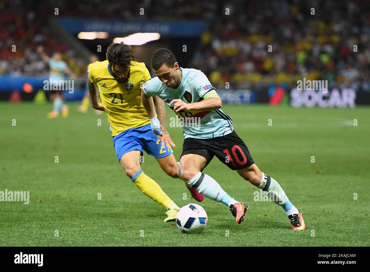 Eden Hazard of Belgium duels with Jimmy Durmaz of Sweden during the UEFA Euro 2016 Group E match between Sweden and Belgium at Stade de Nice in Nice, France on June 22, 2016 (Photo by Andrew Surma/NurPhoto) *** Please Use Credit from Credit Field *** Stock Photo