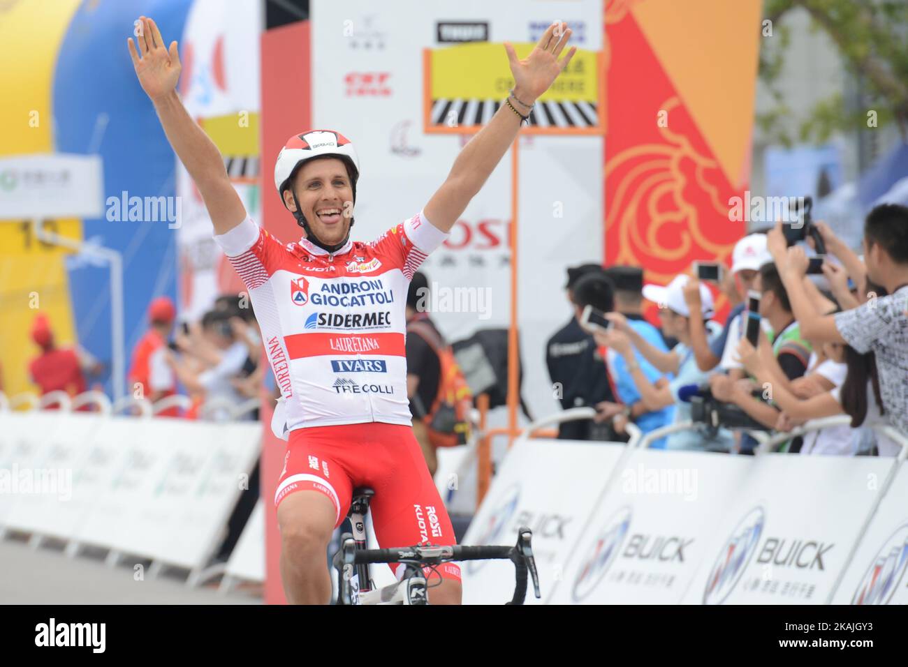 Mattia De Marchi from Androni Giocattoli team wins the fourth stage, 157.57 km from Bazhong to Pingchang, during the 2016 Tour of China 1. On Tuesday, 13 September 2016, in Pingchang, China. Photo by Artur Widak *** Please Use Credit from Credit Field *** Stock Photo