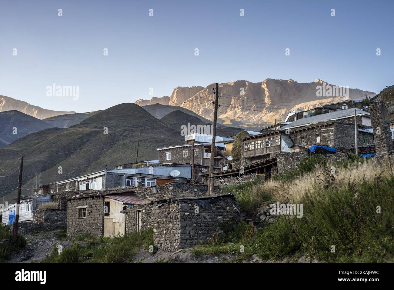 Houses on the top of Khinalig village, Quba region, Azerbaijan. Khinalig is an ancient village deep in the Caucasian mountains on the height of more than 2,300 meters above the sea level. Local people, called Kettid have preserved their traditional way of life. It can be seen even in the architecture. Khinalig people built their houses one over another. As a result, the roof of a building becames a yard for a higher one. Local men spend every sunset in such yards; they drink tea and look at the mountains. ( (Photo by Oleksandr Rupeta/NurPhoto)) *** Please Use Credit from Credit Field *** Stock Photo