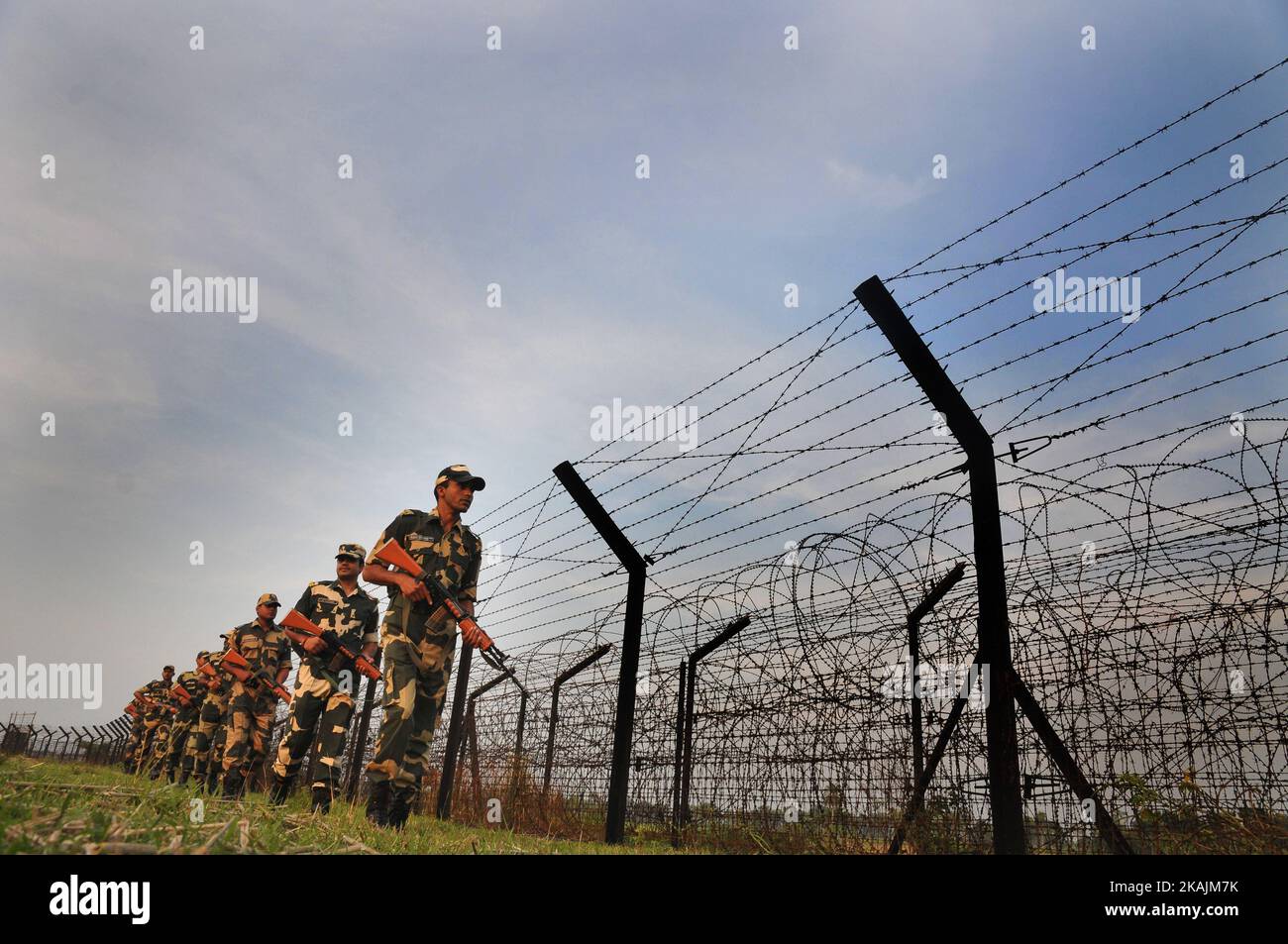 Indian Border Security Force (BSF) soldiers patrolling at the near Petrapole Border outpost at the India-Bangladesh Border on the outskirts of Kolkata,India.India arrested two citizens and said it was expelling a Pakistani high commission staffer for 'espionage activities'on  27 October 2016  after busting a ring that collected documents on defence deployment and border area maps. (Photo by Debajyoti Chakraborty/NurPhoto) *** Please Use Credit from Credit Field *** Stock Photo