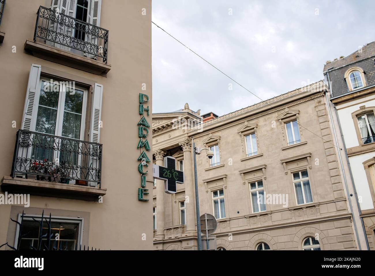 Pharmacie signage drug store neon illuminated sign on the facade of the