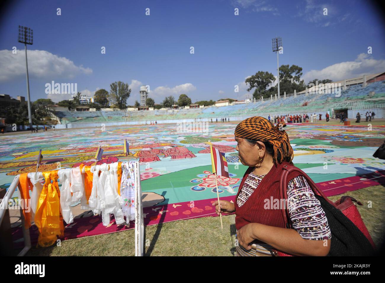 Nepalese Buddhist Kora Arounds World's largest Thangka Painting of 12