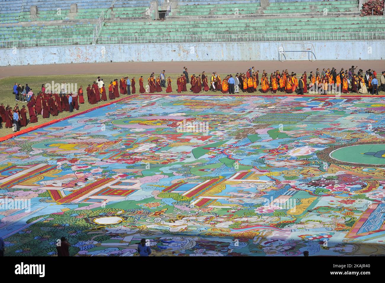 Nepalese Buddhist Kora Arounds World's largest Thangka Painting of 12