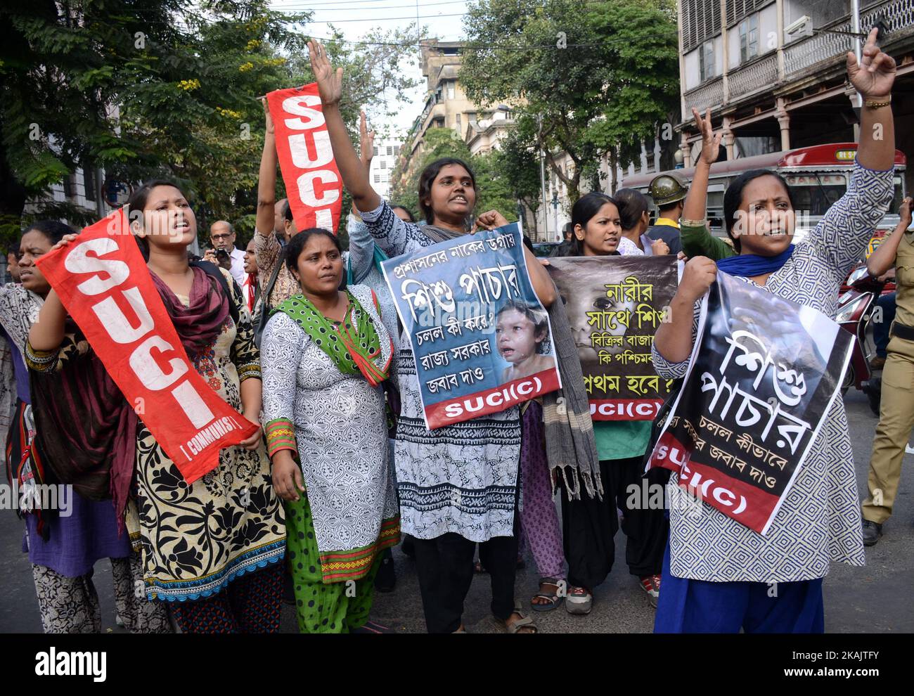 Activists of Socialist Unity Center of India-Marxist (SUCI-M) shouting slogans during the protest against child trafficking in West Bengal in Kolkata , India on Tuesday , 29th November , 2016. Several senior doctors and nursing homes in various districts of West Bengal were under the scanner of CID probing into the child trafficking racket unearthed from North 24 Parganas district's Baduria. (Photo by Sonali Pal Chaudhury/NurPhoto) *** Please Use Credit from Credit Field *** Stock Photo