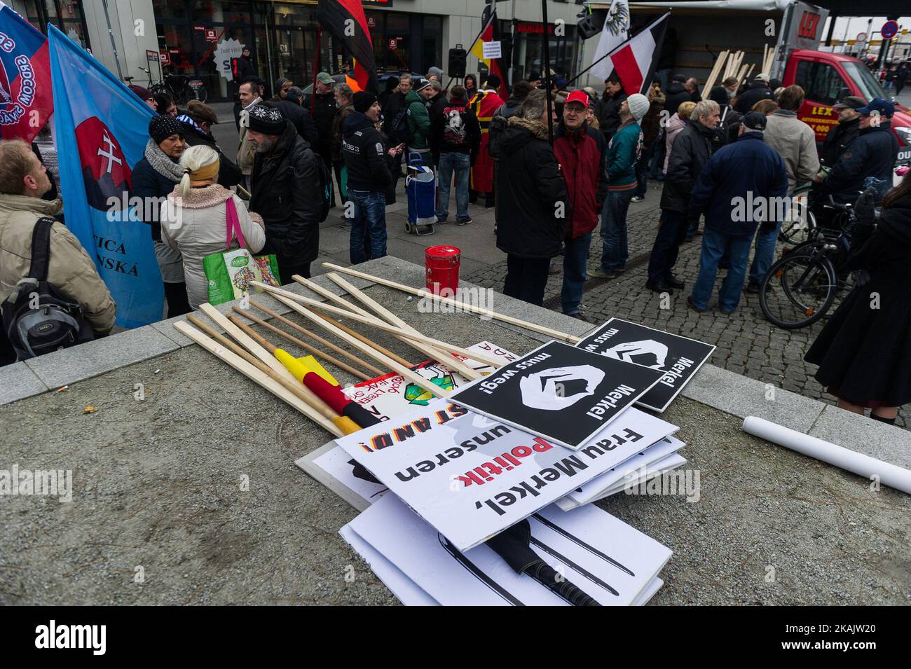 Supporters of the Pegida movement, in Berlin known by its local chapter as Baergida, carry flags and shoot anti-government slogan on November 26, 2015 in Berlin, Germany. Pegida is critical of Islam and many of its supporters see Muslim immigration as a threat to Germany. (Photo by Markus Heine/NurPhoto) *** Please Use Credit from Credit Field *** Stock Photo