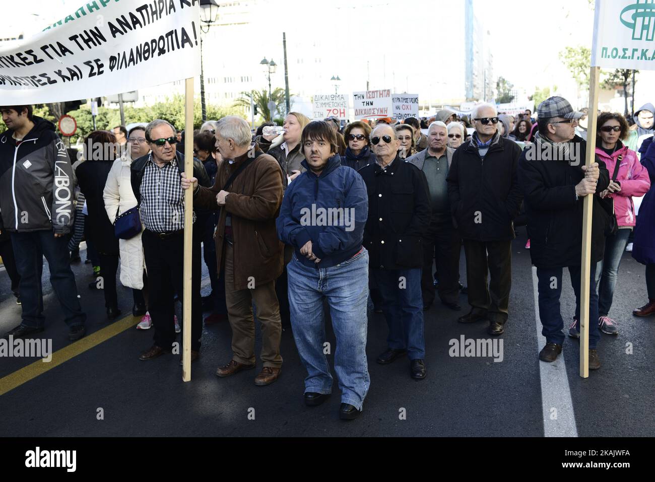 People with disabilities protest against austerity cuts in central Athens on December 2, 2016. A demonstration was held in Athens against austerity policies into welfare and disability benefits ahead of the international day of persons with disability. (Photo by Gerasimos Koilakos/NurPhoto) *** Please Use Credit from Credit Field *** Stock Photo