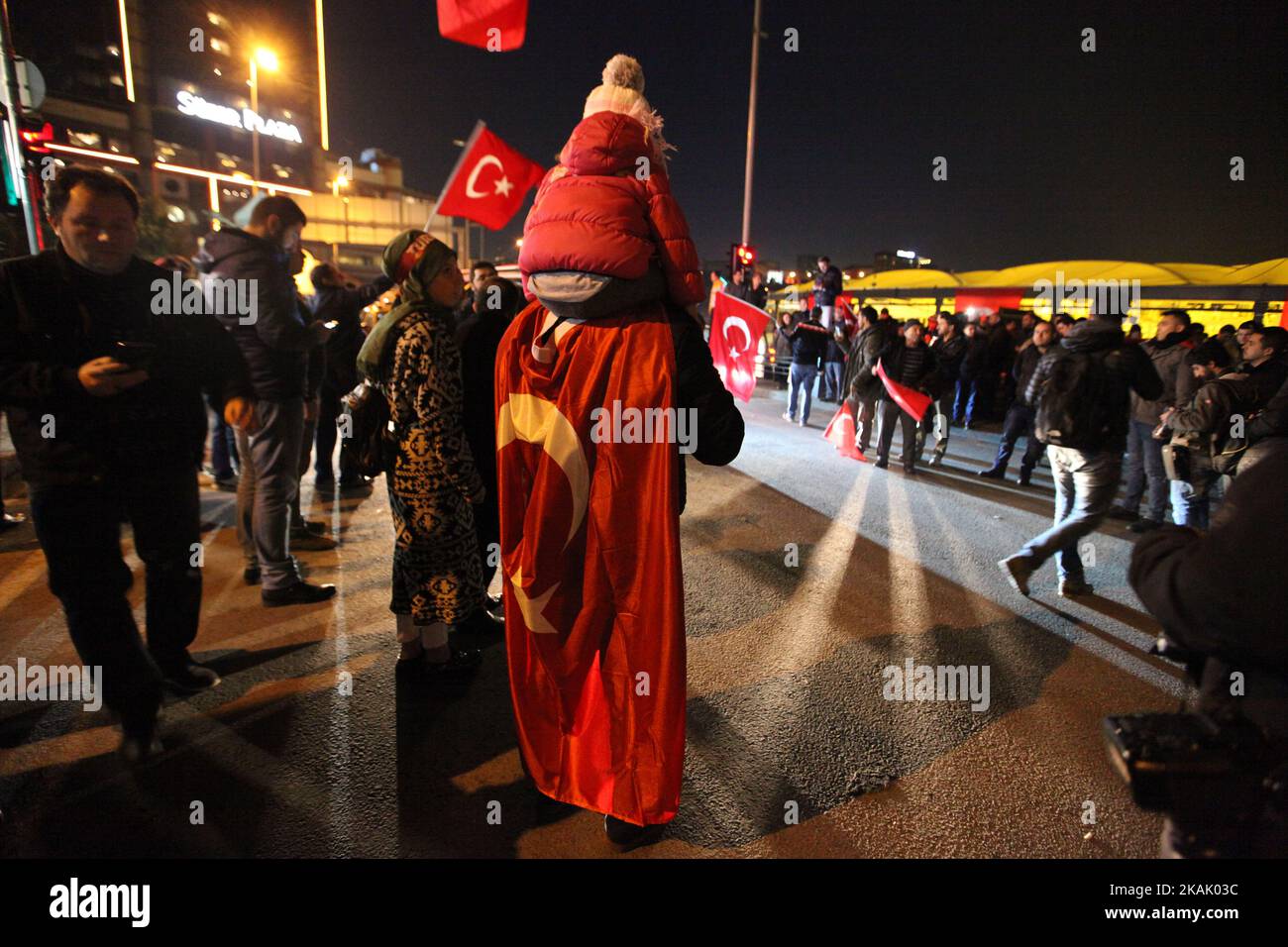 People visit the scene of Saturday's blasts on December 11, 2016 in Istanbul, Turkey. According to Interior Minister Suleyman Soylu, at least 38 people were killed and 166 other wounded in twin explosions outside Besiktas FC's Vodafone Arena Stadium and in nearby Macka Park a few hours after the night's soccer match on 10 December. The bombs apparently targeted police officers who were securing the match. The Kurdish nationalist group Kurdistan Freedom Hawks, which seeks an independent Kurdish state in eastern and southeastern Turkey, claimed responsibility for the attack, according to publish Stock Photo