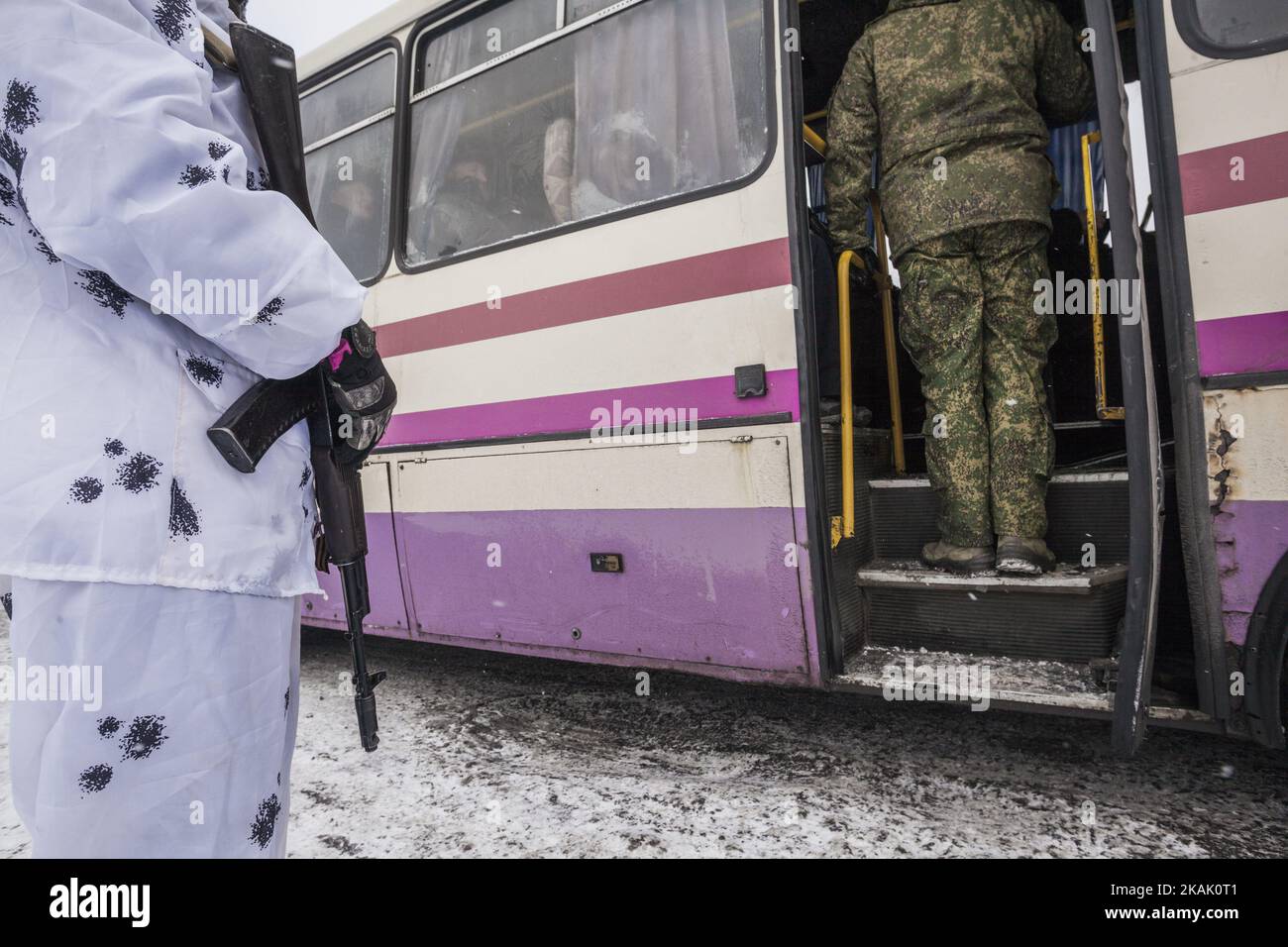 Soldiers of the Donetsk PeopleÂ´s Republic, DPR, check a public bus at the border checkpoint with ukrainian army in Gorlovka, Ukraine, on December 15, 2016. (Photo by Celestino Arce/NurPhoto) *** Please Use Credit from Credit Field *** Stock Photo