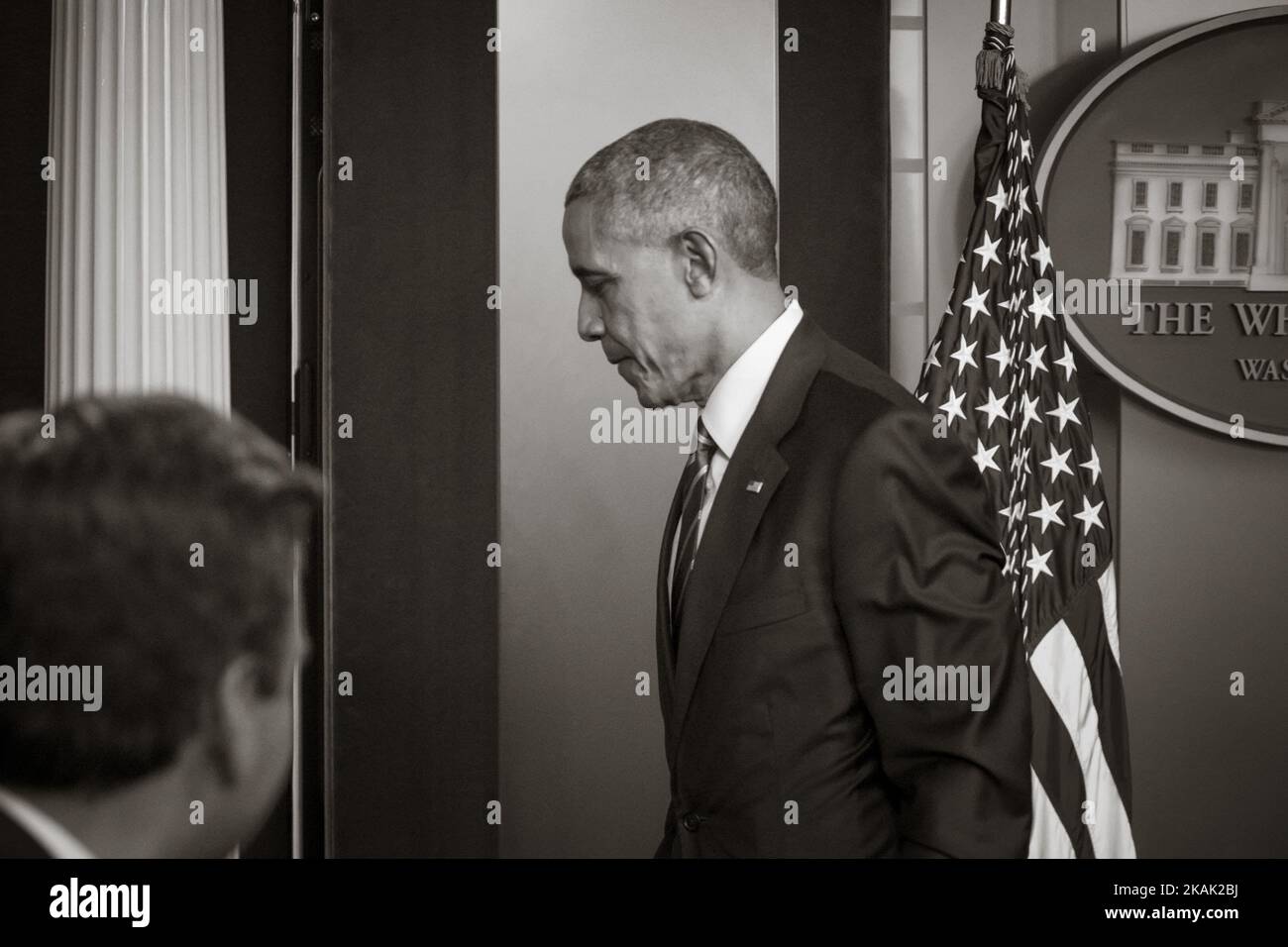US President Barack Obama leaves after a year-end press conference in the Brady Press Briefing Room of the White House in Washington, DC, December 16, 2016. Obama on Friday warned his successor Donald Trump against antagonizing China by reaching out to Taiwan, saying he could risk a 'very significant' response if he upends decades of diplomatic tradition. (Photo by Cheriss May/NurPhoto) *** Please Use Credit from Credit Field *** Stock Photo