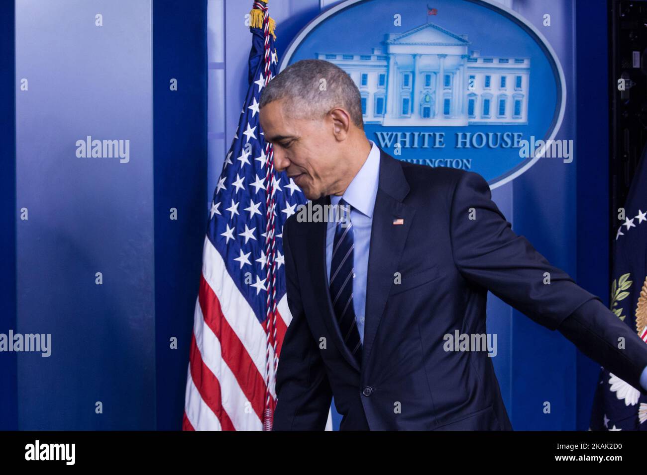 US President Barack Obama leaves after a year-end press conference in the Brady Press Briefing Room of the White House in Washington, DC, December 16, 2016. Obama on Friday warned his successor Donald Trump against antagonizing China by reaching out to Taiwan, saying he could risk a 'very significant' response if he upends decades of diplomatic tradition. (Photo by Cheriss May/NurPhoto) *** Please Use Credit from Credit Field *** Stock Photo