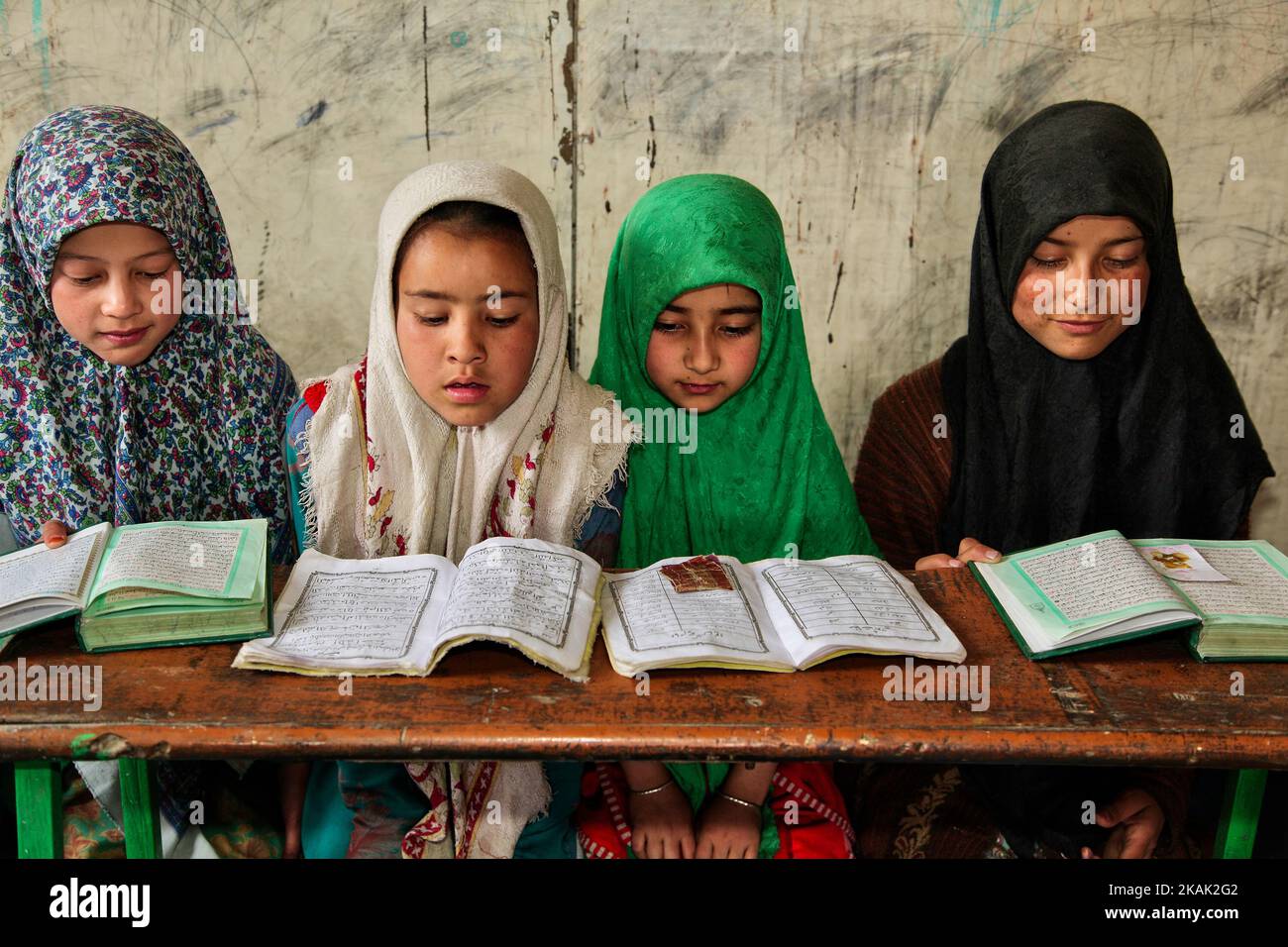Muslim children study the Quran at a Madrassa (Islamic religious school) in a small village near the town of Kargil in Ladakh, Jammu and Kashmir, India on June 25, 2014. (This image has a signed model release). (Photo by Creative Touch Imaging Ltd./NurPhoto) *** Please Use Credit from Credit Field *** Stock Photo