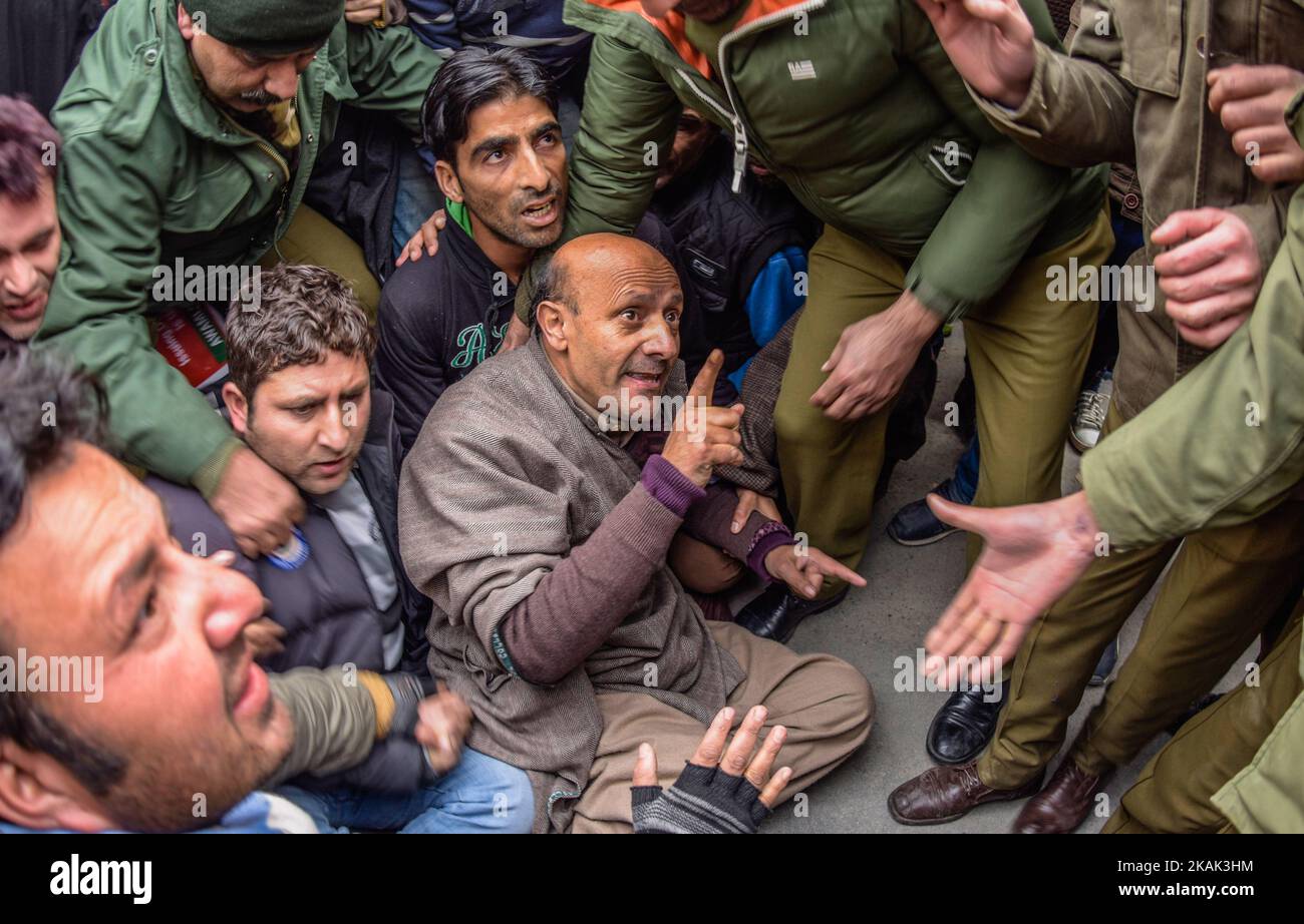 Indian government forces detain, Engineer Sheikh Abdul Rashid an Indian Politician and Member of Legislative Assembly (MLA) and patron of Awami Ithaad Party, a pro-Indian political party, during a protest against India's proposal to allow refugees from the west of Pakistan to settle in the disputed region of Jammu and Kashmir on December 22, 2016 in Srinagar, the summer capital of Indian administered Kashmir, India. (Photo by Yawar Nazir/NurPhoto) *** Please Use Credit from Credit Field *** Stock Photo