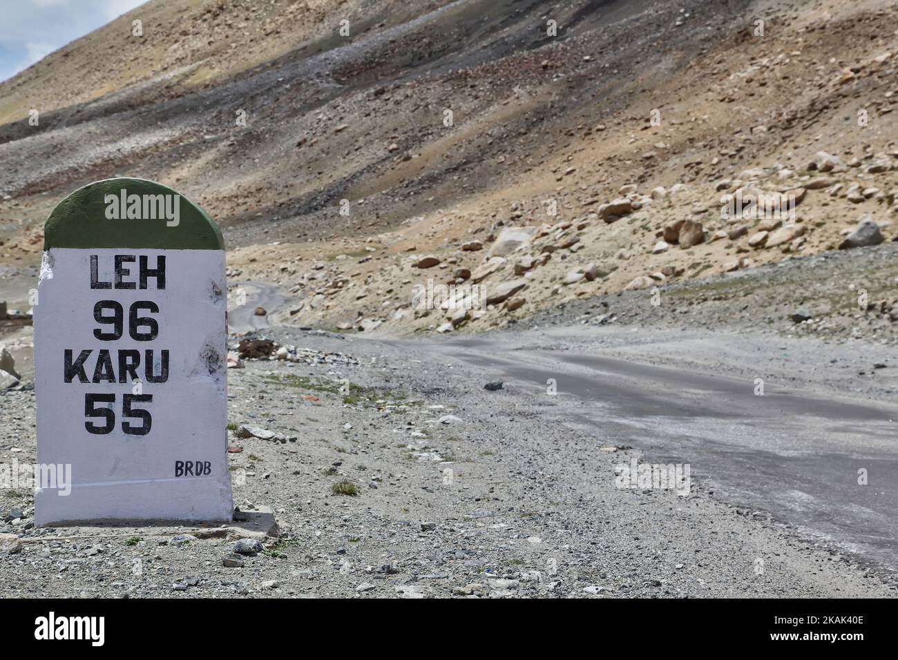 Milestone showing the distances to the town of leh and the village of Karu along a road cutting through the Himalayas in Tsoltak, Ladakh, Jammu and Kashmir, India. (Photo by Creative Touch Imaging Ltd./NurPhoto) *** Please Use Credit from Credit Field *** Stock Photo