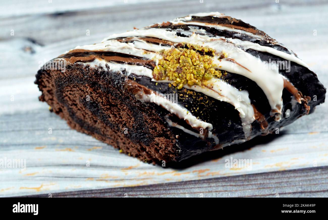 A chocolate cake roll Swiss roll, combination of light chocolate sponge