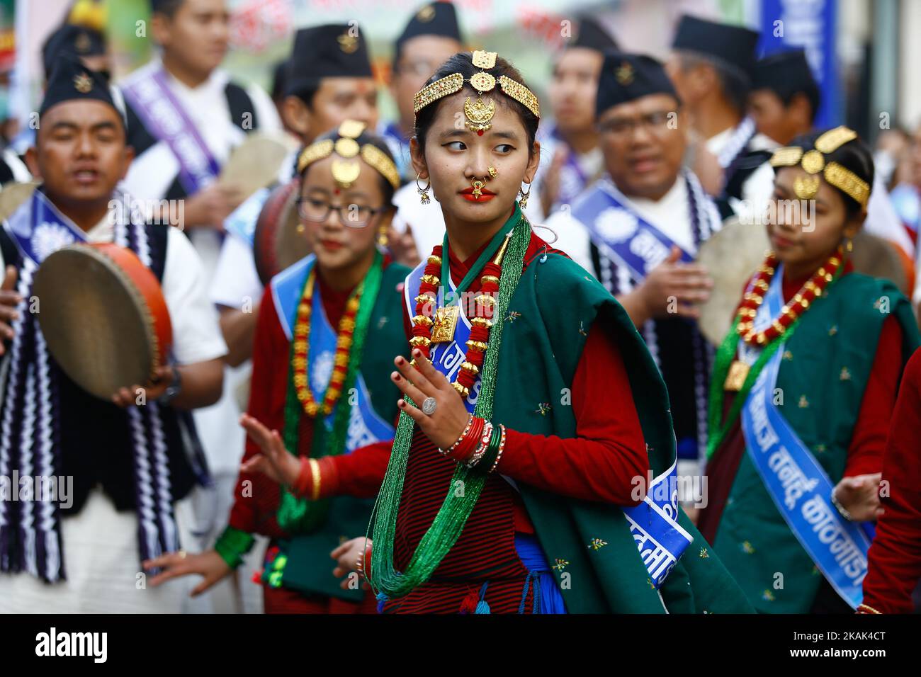 Nepalese From Ethnic Gurung Community In Traditional Attire Dance While Taking Part In Parade To